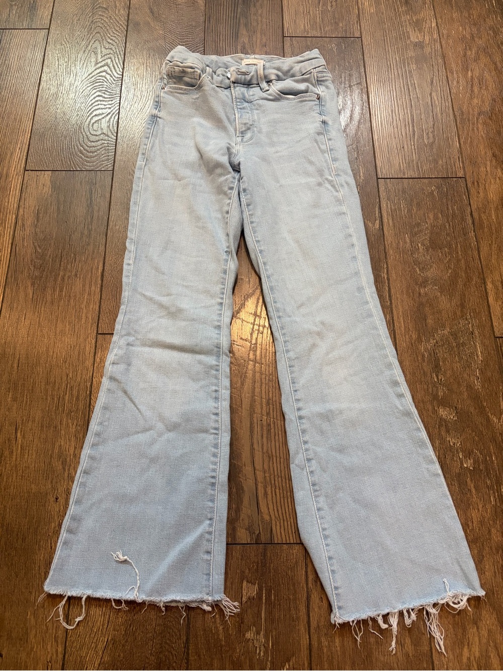 Good American Light Blue Flare Jeans with Raw Hem